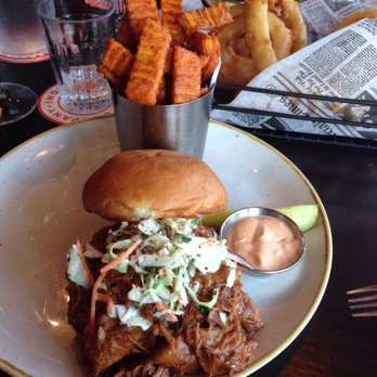 Red Cow 50th & France - Root beer BBQ pulled pork sandwich with sweet potato fries - Burgers Near Me - Minneapolis, Minnesota Red Cow 50th & France - Root beer BBQ pulled pork sandwich with sweet potato fries - Burgers Near Me - Minneapolis, Minnesota