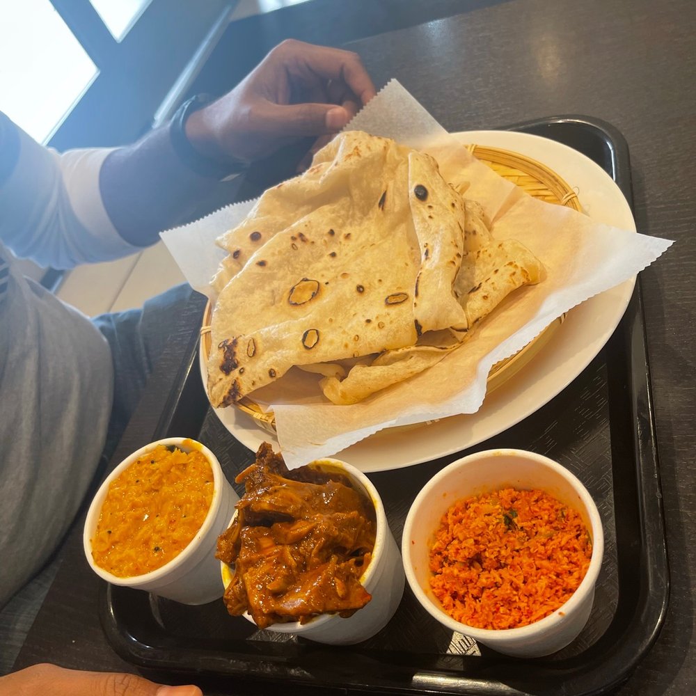Rice N' Spice - Godamba Roti, Pol (coconut) Sambol & Lentils Curry - Sri Lankan Near Me - Anaheim, California Rice N' Spice - Godamba Roti, Pol (coconut) Sambol & Lentils Curry - Sri Lankan Near Me - Anaheim, California
