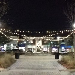 The Market at Oakland - Lights around the weird statue thing.