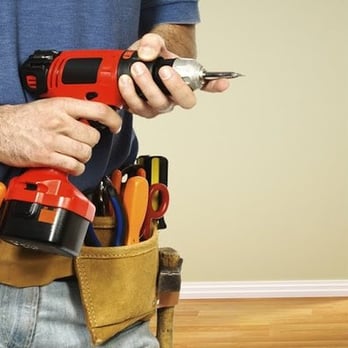 JWT Enterprises - a man holding a tool belt - General Contractors Near Me - Frederick, Maryland