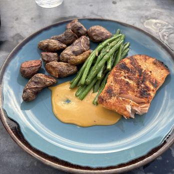 Flora Rooftop Bar - Salmon entree, not worth the $35. Salmon was brutally overcooked. But I ate it all anyway bc I was hungry. - Lounges Near Me - El Segundo, California Flora Rooftop Bar - Salmon entree, not worth the $35. Salmon was brutally overcooked. But I ate it all anyway bc I was hungry. - Lounges Near Me - El Segundo, California