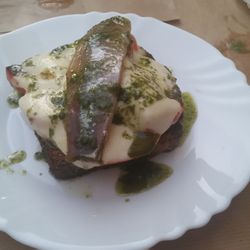 El Remedio - Sardines and cheeses on dark bread. It is a perfect balance of flavor.