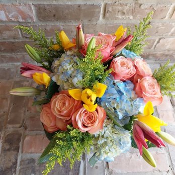 In Step Floral Design - It's a boy soft peach, blue and yellow. - Florists Near Me In Step Floral Design - It's a boy soft peach, blue and yellow. - Florists Near Me