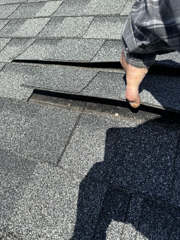 Slide of New Vallee Roofing