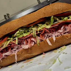 Jersey Gurlz Subs N More - Our #1 seller, the Italian featuring Deluxe Ham, Capicola, Salami, Pepperoni, and provolone cheese with your choice of toppings.