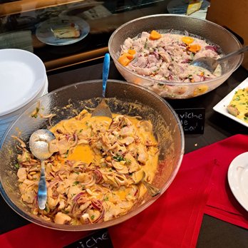 Chicha Peruvian Kitchen - Monthly Sunday buffet offering - two types of ceviche - seafood ceviche and fish ceviche - Peruvian Near Me - Roseville, California Chicha Peruvian Kitchen - Monthly Sunday buffet offering - two types of ceviche - seafood ceviche and fish ceviche - Peruvian Near Me - Roseville, California