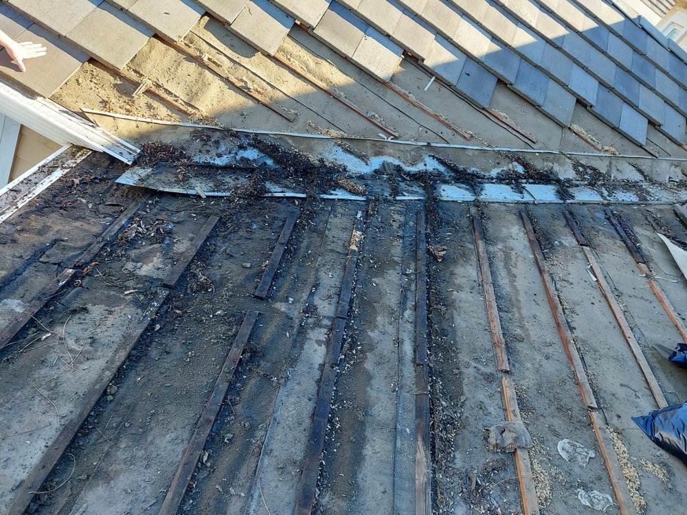 Slide of Landeros Roofing Solutions