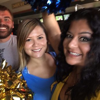 CJ's Club - a group of cheerleaders posing for a picture - Sports Bars Near Me - San Diego, California