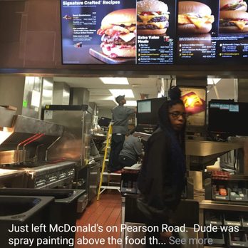 McDonald's - a man standing in front of a menu - Fast Food Near Me - Pearl, Mississippi McDonald's - a man standing in front of a menu - Fast Food Near Me - Pearl, Mississippi