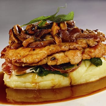 Primo - Sautéed Scaloppine of Pork Saltimbocca in a sage infused mushroom-madeira jus with prosciutto, spinach and roasted garlic mashed - Italian Near Me - Orlando, Florida