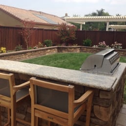 Grill, retaining wall and patio Grill, retaining wall and patio