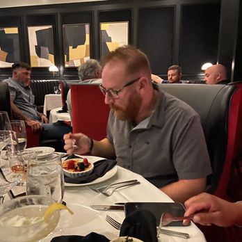 Duke's Steakhouse - Adam enjoying his crème brûlée ! - Steakhouses Near Me - Sparks, Nevada Duke's Steakhouse - Adam enjoying his crème brûlée ! - Steakhouses Near Me - Sparks, Nevada