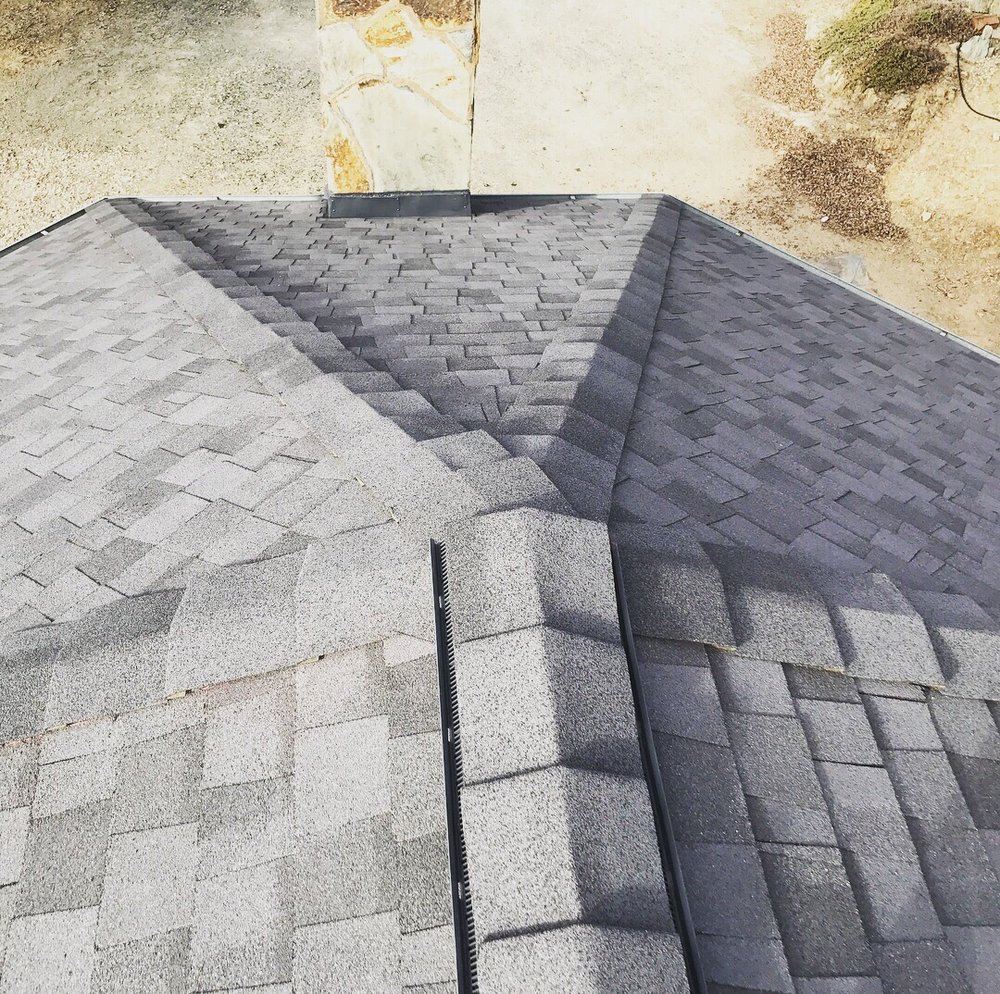 Slide of Kelly Roofing