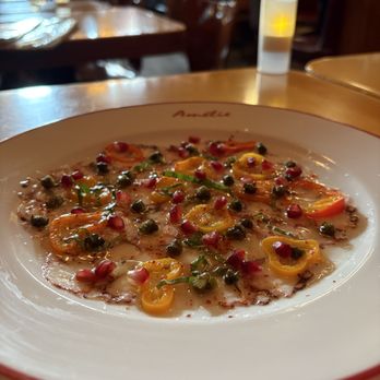 Amélie - Octopus Carpaccio - pickled capers, pickled peppers, pomegranate - Wine Bars Near Me - San Francisco, California Amélie - Octopus Carpaccio - pickled capers, pickled peppers, pomegranate - Wine Bars Near Me - San Francisco, California