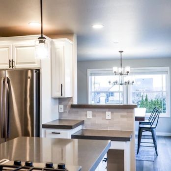 Puget Sound Remodeling - Kitchen after--light and bright, just what we wanted - General Contractors Near Me - Tacoma, Washington