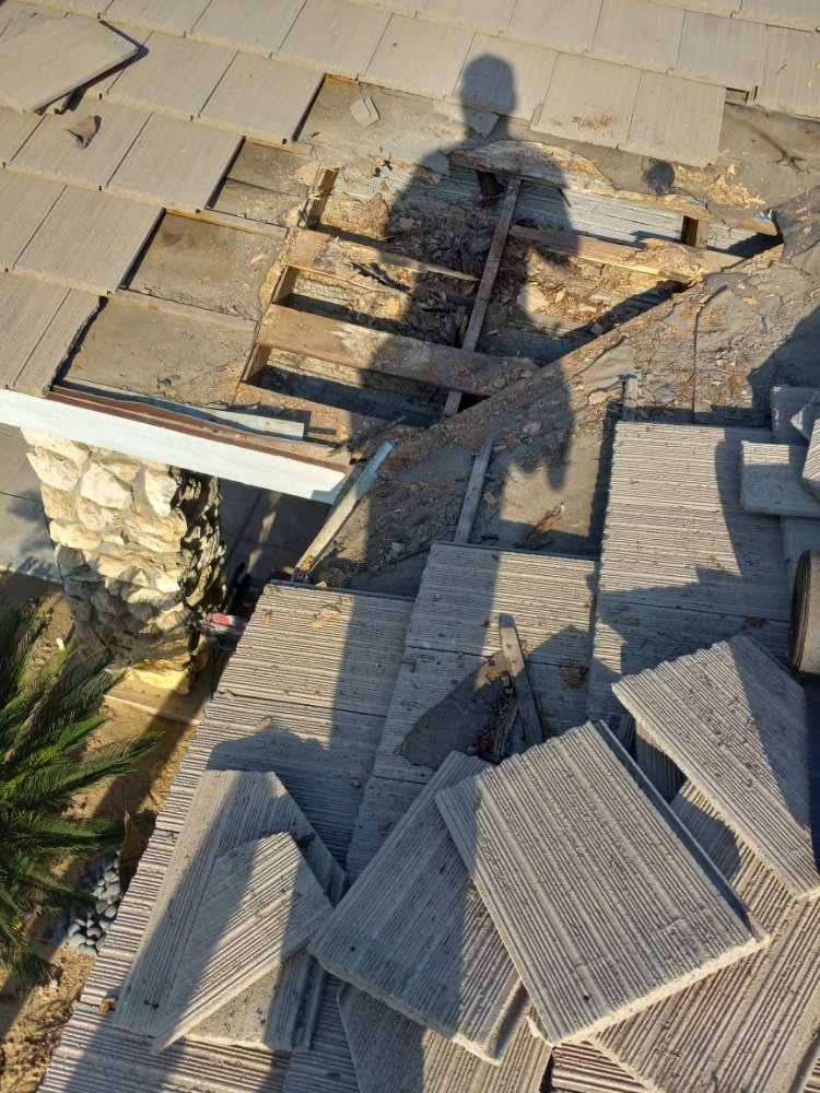 Slide of Martinez Roofing Repair