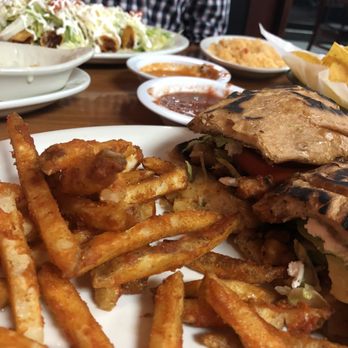 El Cazuelon - Pastor torta and seasoned french fries. - Mexican Near Me - Winder, Georgia