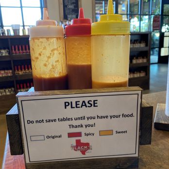 Terry Black's Barbecue - Waco - Original sauce, Spicy sauce, Sweet Sauce. All were amazing and quite flavorful. my favorite is the spicy with just the perfect kick! - Barbeque Near Me - Waco, Texas