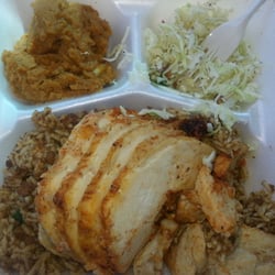 Russell's Food Center - Turkey Roll w/rice dressing, coleslaw and sweet potato.