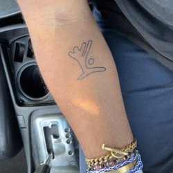Black Torch Tattoo - The Scarlet Witch's Rune from WandaVision tattooed by @reesehardie