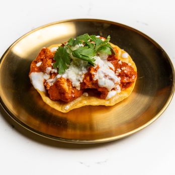 Turmeric & - Our top selling butter chicken tostada! - Indian Near Me - Nashville, Tennessee Turmeric & - Our top selling butter chicken tostada! - Indian Near Me - Nashville, Tennessee