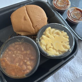 Whole Hog Cafe - Pulled Pork Sandwich w/ Side Mac & Cheese, Side Baked Beans, and mild BBQ sauce - Barbeque Near Me - Little Rock, Arkansas Whole Hog Cafe - Pulled Pork Sandwich w/ Side Mac & Cheese, Side Baked Beans, and mild BBQ sauce - Barbeque Near Me - Little Rock, Arkansas