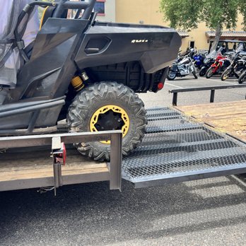 RideNow Powersports Surprise - Helping load another customer's rig while the RideNow team watched them struggle. - Motorcycle Dealers Near Me - Surprise, Arizona RideNow Powersports Surprise - Helping load another customer's rig while the RideNow team watched them struggle. - Motorcycle Dealers Near Me - Surprise, Arizona