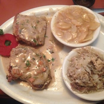 Max's Allegheny Tavern - Roasted pork loin, with German potato salad and sauerkraut. - German Near Me - Pittsburgh, Pennsylvania
