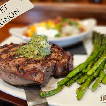 77 Steakhouse and Saloon - Filet Mignon - 10oz charbroiled, bacon wrapped & herb butter. - American Near Me - Hulett, Wyoming 77 Steakhouse and Saloon - Filet Mignon - 10oz charbroiled, bacon wrapped & herb butter. - American Near Me - Hulett, Wyoming