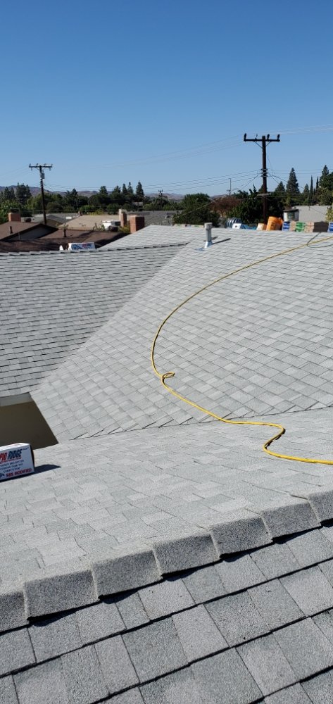 Slide of Three Clovers Roofing