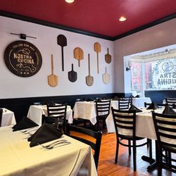 Nostra Cucina - Intimate dining room. Warm and cozy atmosphere.