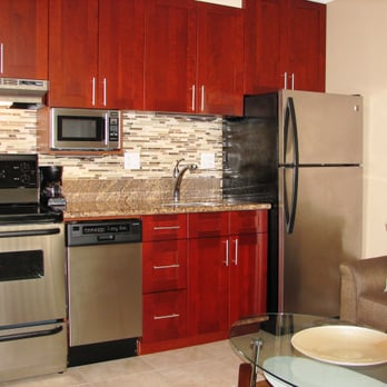 Waikiki Ocean View Condos - Fully equipped kitchen with stainless steel appliances, including a dishwasher and ice maker. - Condominiums Near Me - Honolulu, Hawaii Waikiki Ocean View Condos - Fully equipped kitchen with stainless steel appliances, including a dishwasher and ice maker. - Condominiums Near Me - Honolulu, Hawaii