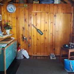Pillar Point Cottage - Entrance of the cottage. This is part of the kitchen. Bedroom on left, living area/porch, waterfront view on the right. Bathroom straight.