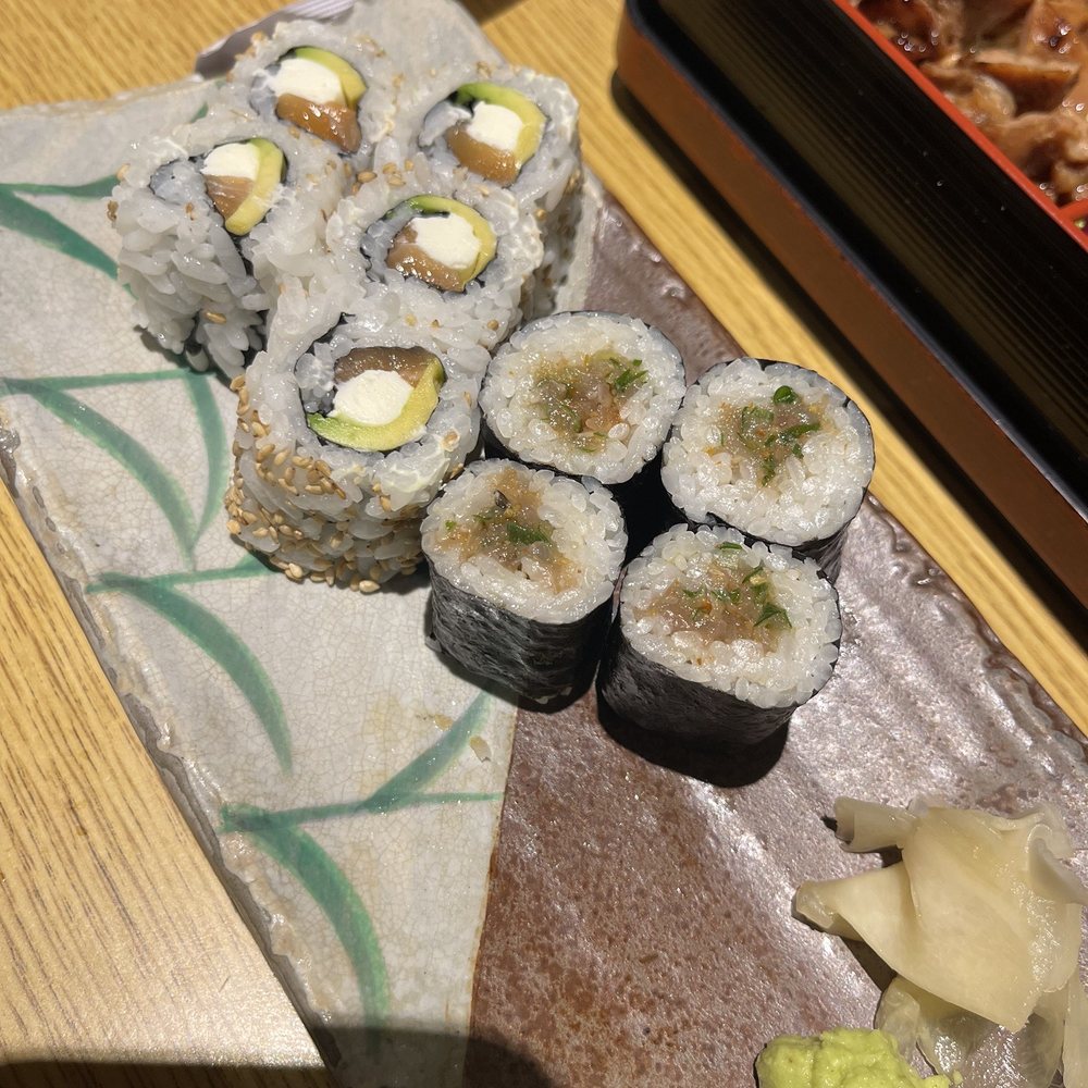 Philadelphia roll and Spicy Ahi roll (after we had a taste ) Philadelphia roll and Spicy Ahi roll (after we had a taste )