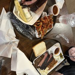 Pic of rib sandwich with side and rib plate 2 sides. No pic of the chopped sandwich and jalapeño cheddar poppers but they were the best.