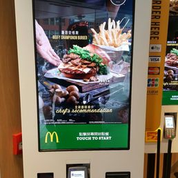 They have these cool kiosks to place your order then pick up at the counter