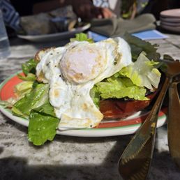 Avocado toast with over easy egg Avocado toast with over easy egg