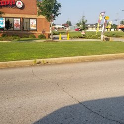 Wendy's - Drive thru closed with wet floor signs.