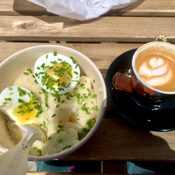 Ain't Normal Cafe - My delish macchiato and grits, partially consumed. - Coffee & Tea Near Me - Oakland, California