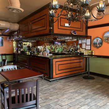 Los Tios Grill - Quaint, but fully stocked bar. - Salvadoran Near Me - Arlington, Virginia