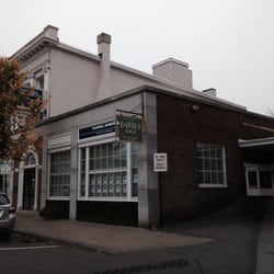 Paragon Barbershop - The barbershop is in the back. Here you see the street sign.