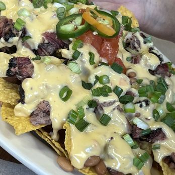 Schoepf's Bar-B-Que - Brisket Queso nachos are brilliant meal by itself. - Barbeque Near Me - Belton, Texas Schoepf's Bar-B-Que - Brisket Queso nachos are brilliant meal by itself. - Barbeque Near Me - Belton, Texas