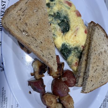 Courtneys Cafe - Greek omelet with rye roast and potatoes - Cafes Near Me - Atlantis, Florida Courtneys Cafe - Greek omelet with rye roast and potatoes - Cafes Near Me - Atlantis, Florida