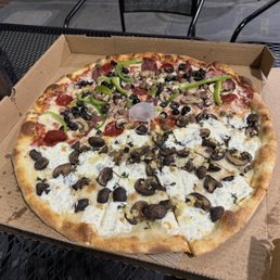 Combo and mushroom pizza