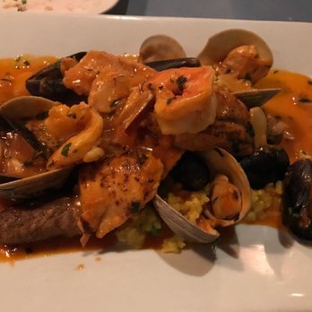 Lemon Mediterranean Restaurant - Seafood Paella - Chicken Breast, Sausage, Clams, Mussels, and Shrimp - Mediterranean Near Me - Freehold, New Jersey Lemon Mediterranean Restaurant - Seafood Paella - Chicken Breast, Sausage, Clams, Mussels, and Shrimp - Mediterranean Near Me - Freehold, New Jersey