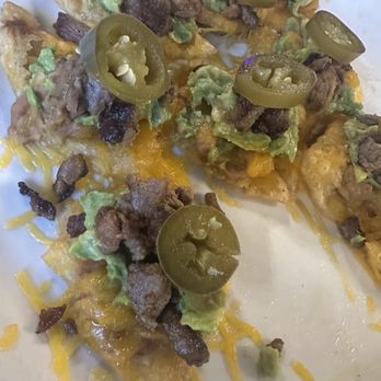 Rocha’s Bar & Grill - Puffy Nachos - Breakfast & Brunch Near Me - Laredo, Texas Rocha’s Bar & Grill - Puffy Nachos - Breakfast & Brunch Near Me - Laredo, Texas