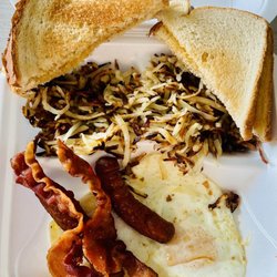 Jazzy’s Diner - 2 eggs with 4 meat: over medium, sausage links , bacon, hash brown, white toasts