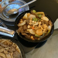 Friendly Restaurant - Can't remember, but it's beef and spicy!