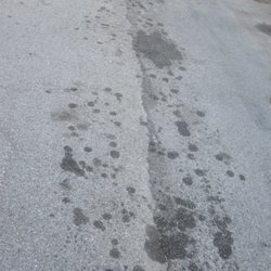 Santa Monica City Hall - Garbage truck had a leaking hydraulic line, blew gallons and gallons of fluid all over the surrounding alleys.