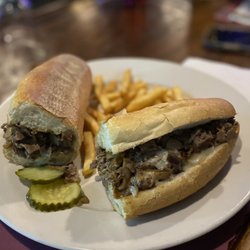 The Cabin Bar And Grill - Cheesesteak with onions and mushrooms